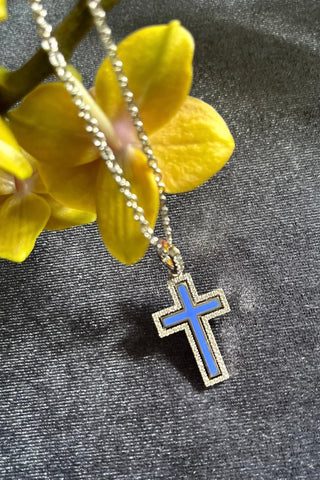 A  jewellery Catholic cross of the Petite Harmony , white 18K gold,  enamel,  diamonds.  VARVARA collection brand. 18K white gold, coloured enamel, 74 round cut diamonds FG\VS1 Weight of gold 5.78g Diamonds, carat total weight 0.4ct