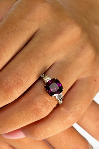 Cocktail ring, white and yellow gold 750. Purple garnet and diamonds. 