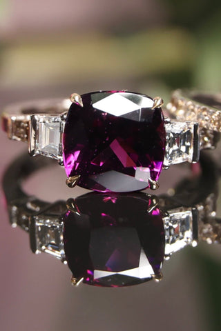 Cocktail ring, white and yellow gold 750. Purple garnet and diamonds. 