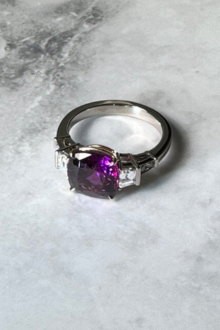 Cocktail ring, white and yellow gold 750. Purple garnet and diamonds. 