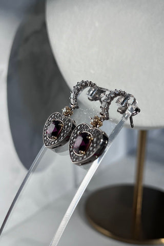 earrings Mon Coeur,  VARVARA collection . 18k white and yellow gold, purple garnet, 110 diamonds  Garnet, carat total weight 3.14ct, Diamonds, carat total weight 1.97ct .
varvara-collection.com