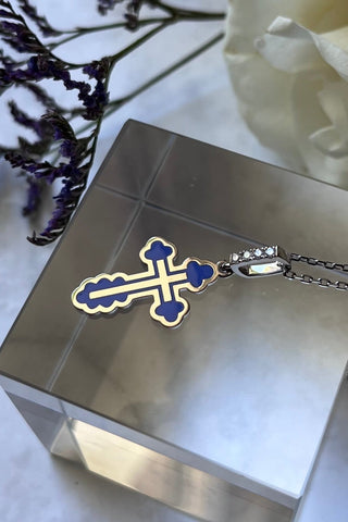 A handmade Orthodox cross of the Gloria series in small size.18K white gold and coloured enamel, pendant is decorated with four diamonds. 