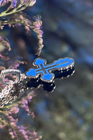 A handmade Orthodox cross of the Gloria series in small size.18K white gold and coloured enamel, pendant is decorated with four diamonds. 