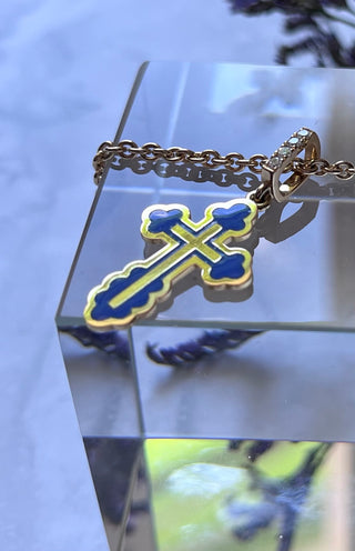 An Orthodox cross of the Gloria series in small size, 18K yellow gold and coloured enamel, pendant is decorated with four diamonds. Modern style. VARVARA collection enamel.