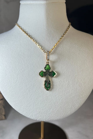 An elegant orthodox cross of the Margaret series with a classic shape is made of 18 carat yellow gold, decorated with coloured transparent enamel and diamonds. VARVARA collection.